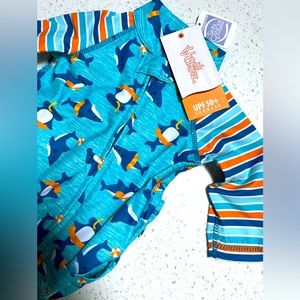 Brand new UV Skins rashgard/bathing suit